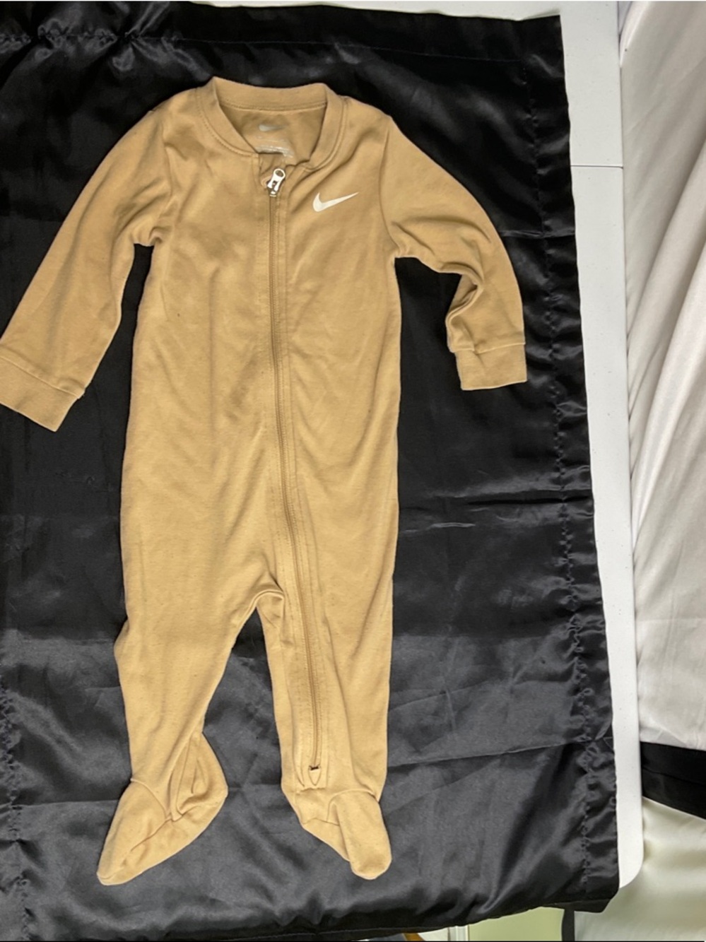 Nike Beige Footed Baby One-Piece with White Swoosh